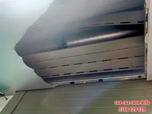 Sửa cửa cuốn sổ nan